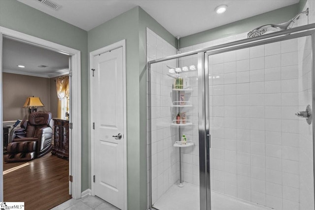 full bath with a stall shower, recessed lighting, visible vents, and tile patterned floors