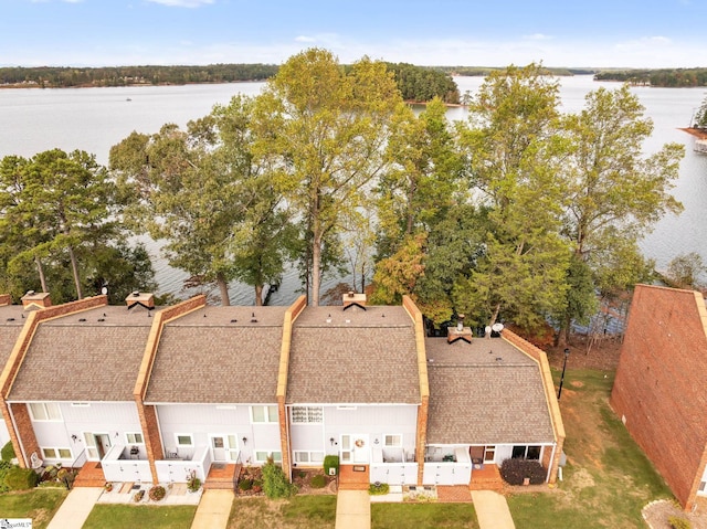 drone / aerial view with a water view