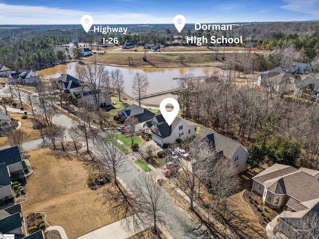 aerial view with a water view and a residential view