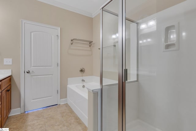 bathroom featuring a stall shower, baseboards, crown molding, vanity, and a bath