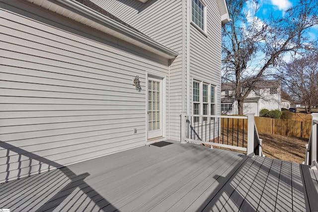 wooden deck featuring fence