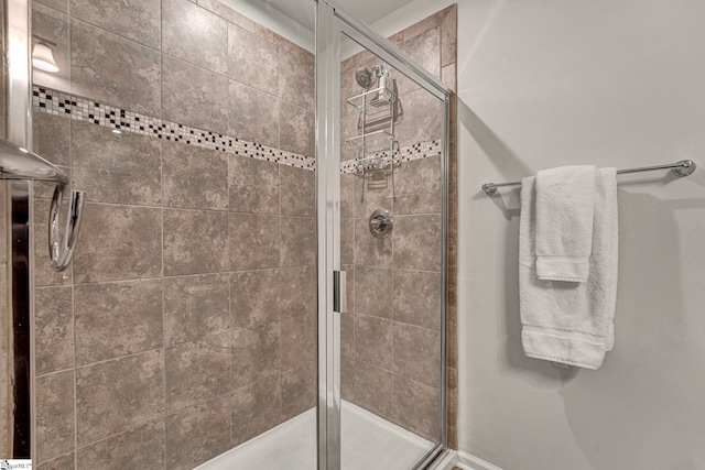 full bath featuring a stall shower