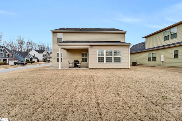 rear view of property with a patio