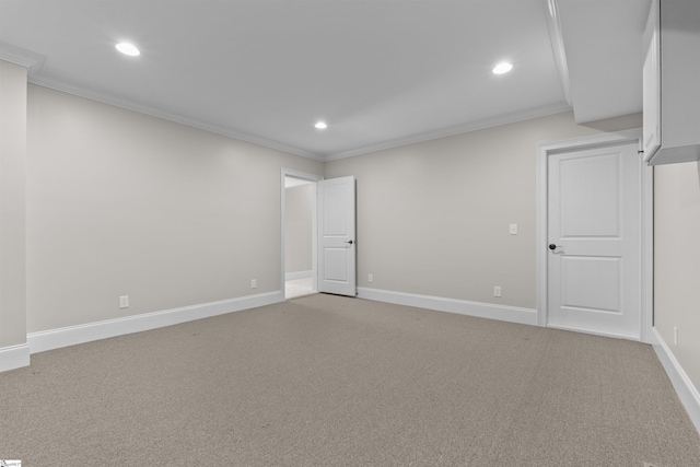 interior space with ornamental molding, recessed lighting, and baseboards