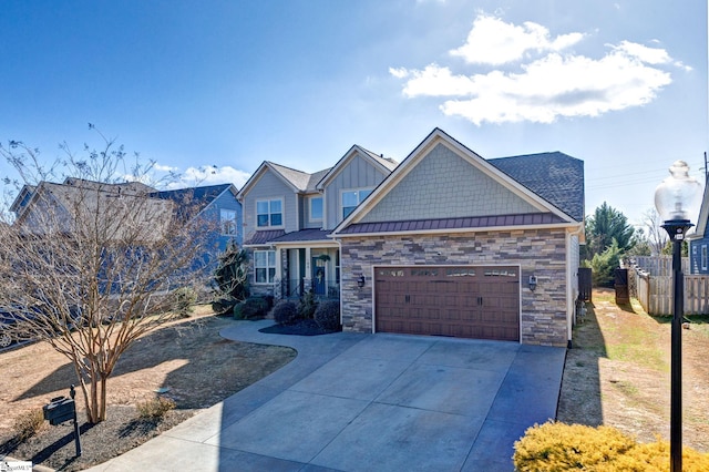 craftsman house with an attached garage, board and batten siding, a standing seam roof, metal roof, and driveway