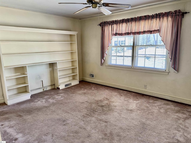 unfurnished living room featuring carpet, baseboard heating, and ceiling fan