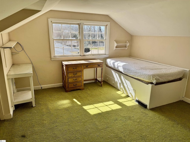 unfurnished bedroom featuring lofted ceiling, carpet floors, and baseboards