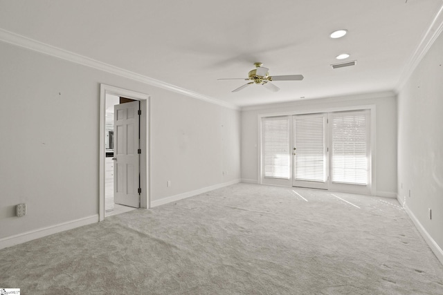 interior space featuring carpet flooring, visible vents, baseboards, access to outside, and crown molding