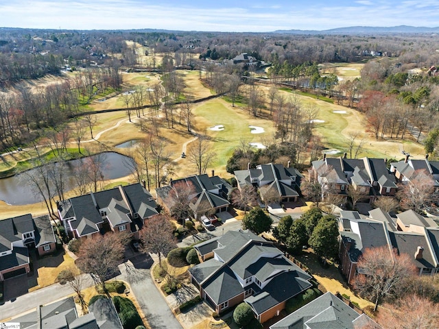 bird's eye view featuring view of golf course, a water view, and a residential view