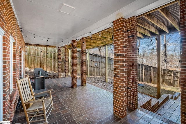 view of patio / terrace featuring grilling area and a fenced backyard