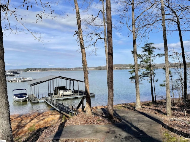 view of dock featuring a water view and boat lift