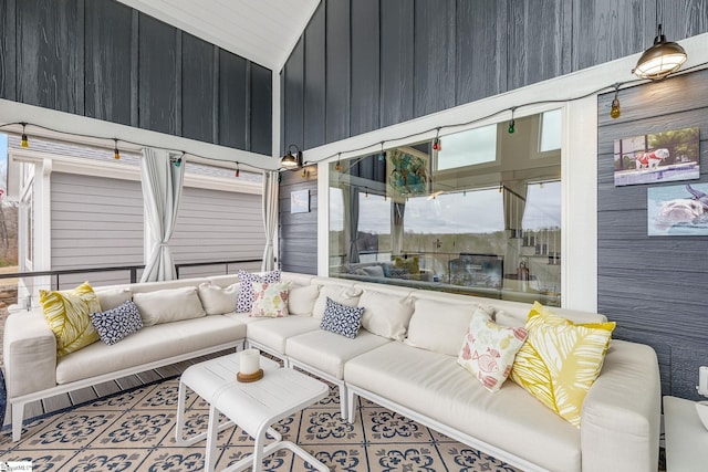 sunroom with lofted ceiling