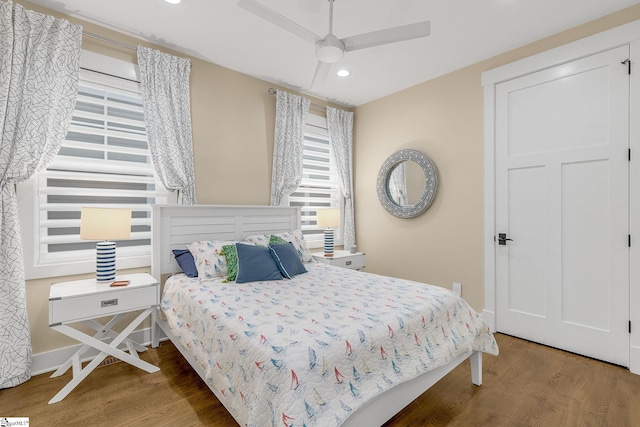 bedroom featuring recessed lighting, ceiling fan, baseboards, and wood finished floors