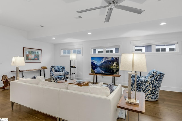 living room featuring recessed lighting, wood finished floors, a ceiling fan, baseboards, and visible vents