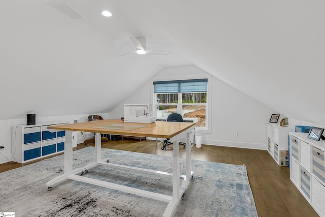 office area with baseboards, vaulted ceiling, wood finished floors, and recessed lighting