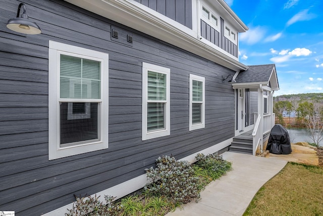 view of property exterior with board and batten siding