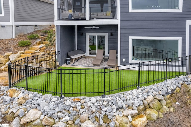 exterior space featuring a yard, crawl space, a patio area, and fence private yard