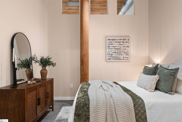 bedroom featuring baseboards