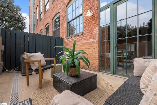 view of patio / terrace with fence