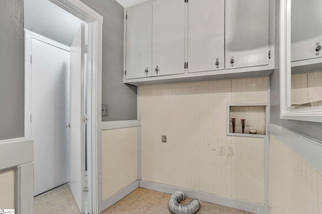 clothes washing area featuring laundry area and hookup for a washing machine