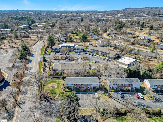 birds eye view of property with a residential view