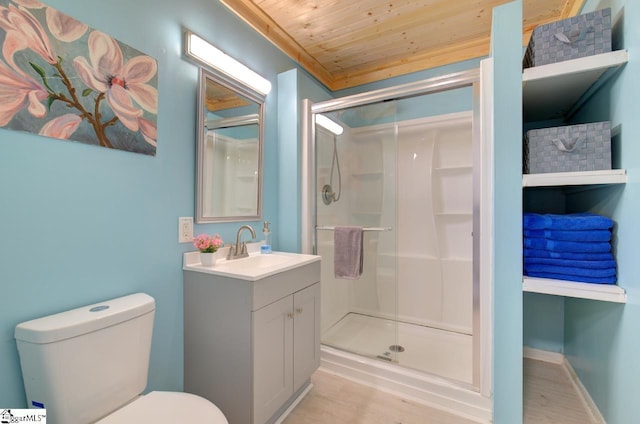 full bathroom with toilet, vanity, a shower stall, and wood ceiling