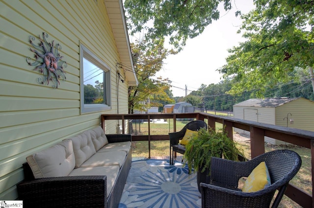 view of wooden balcony featuring an outdoor hangout area and a deck