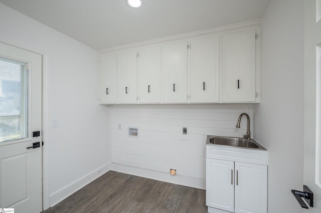 laundry area featuring washer hookup, dark wood finished floors, cabinet space, hookup for an electric dryer, and a sink