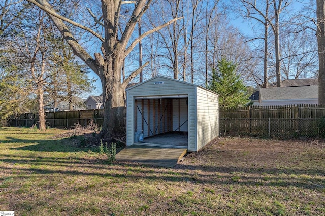 view of shed with a fenced backyard