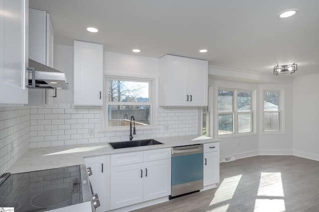 kitchen featuring light stone counters, a sink, visible vents, electric stove, and dishwasher