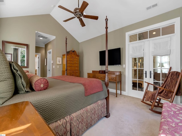 bedroom with visible vents, light colored carpet, lofted ceiling, french doors, and multiple windows