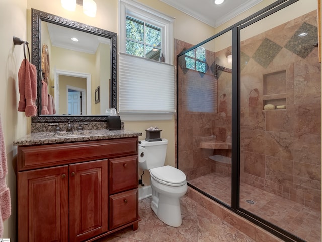 bathroom featuring toilet, a stall shower, crown molding, and vanity