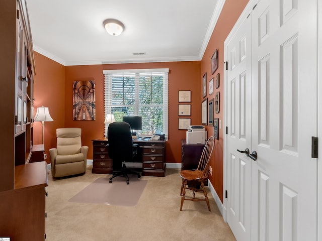 office featuring baseboards, visible vents, crown molding, and carpet flooring