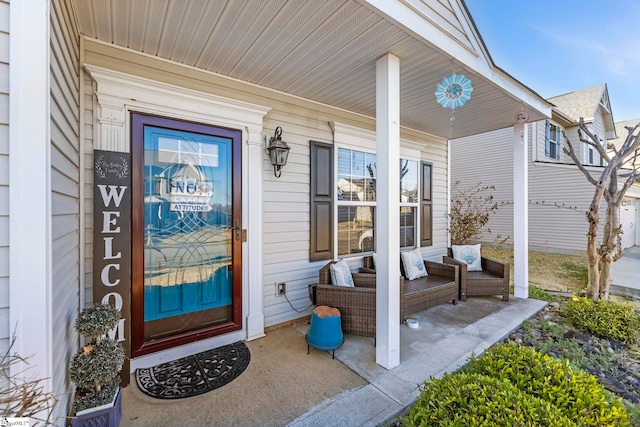 property entrance featuring a porch