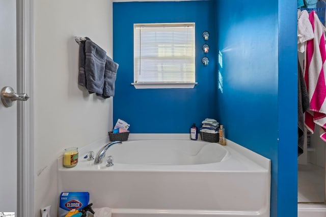 bathroom with a garden tub