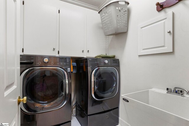204 Waterford Ln, Greer, SC 29650 - clothes washing area with cabinet space, a sink, and separate washer and dryer