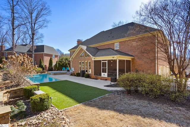 204 Waterford Ln, Greer, SC 29650 - back of house with brick siding, fence, a sunroom, a yard, and a chimney