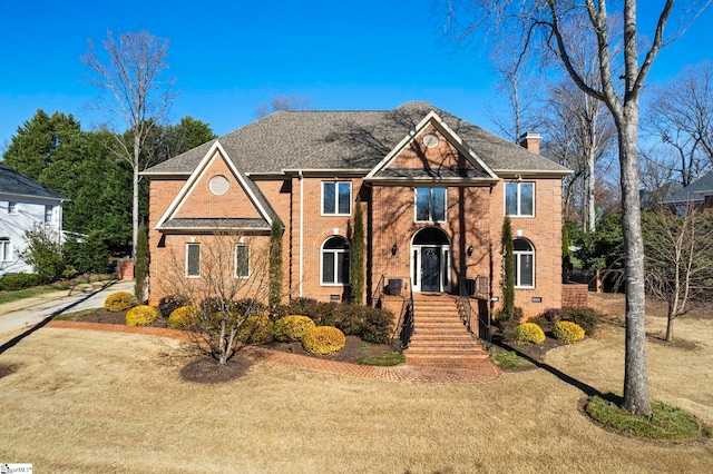 204 Waterford Ln, Greer, SC 29650 - view of front of house with brick siding and a chimney