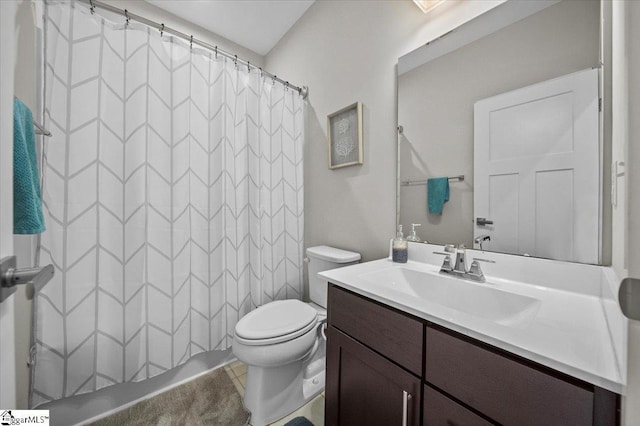 full bathroom featuring toilet, a shower with curtain, tile patterned floors, and vanity