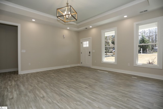 interior space featuring baseboards, plenty of natural light, and recessed lighting