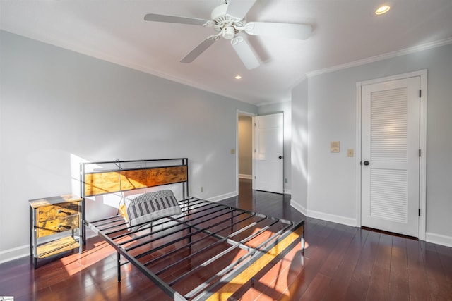 bedroom featuring hardwood / wood-style floors and baseboards