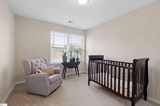 bedroom with carpet flooring and baseboards