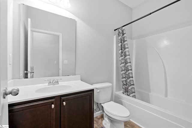 bathroom with shower / bath combination with curtain, vanity, and toilet