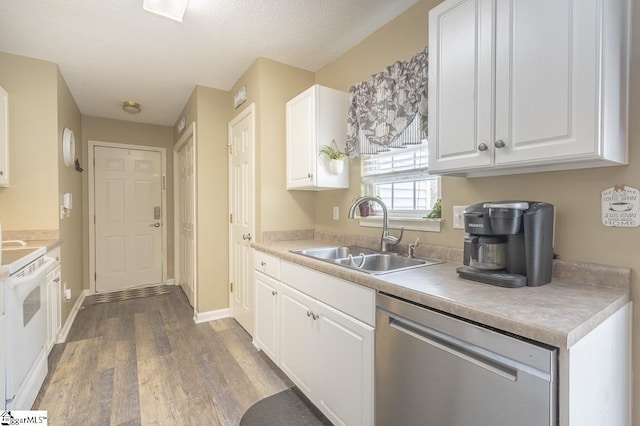 kitchen featuring white electric range oven, white cabinets, dishwasher, wood finished floors, and a sink