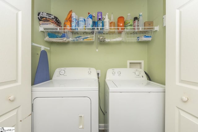 laundry area featuring laundry area and washer and clothes dryer