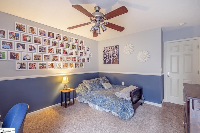 bedroom featuring ceiling fan, carpet floors, and baseboards