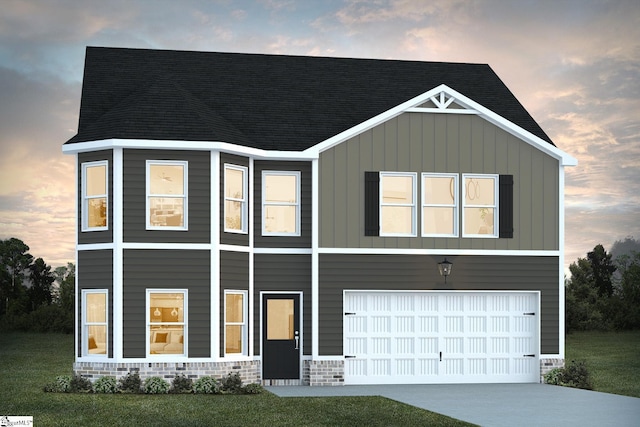 view of front facade featuring driveway, roof with shingles, and an attached garage