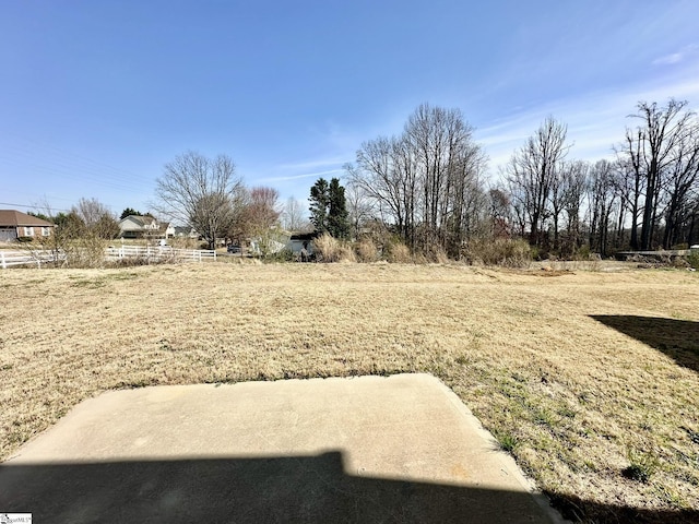 view of yard featuring fence