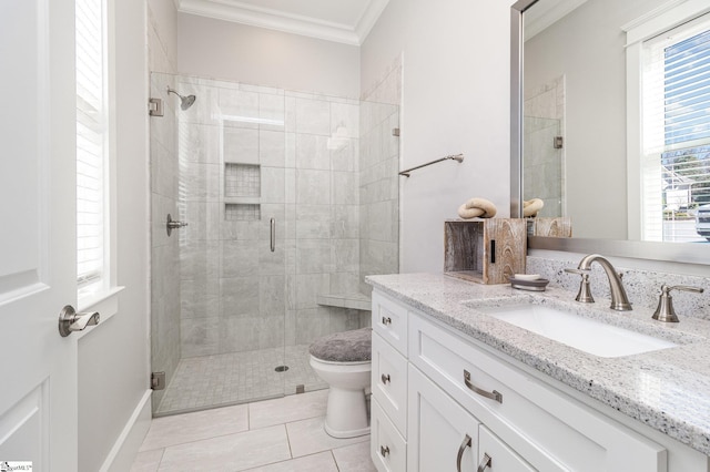 full bathroom featuring toilet, ornamental molding, a stall shower, vanity, and tile patterned flooring