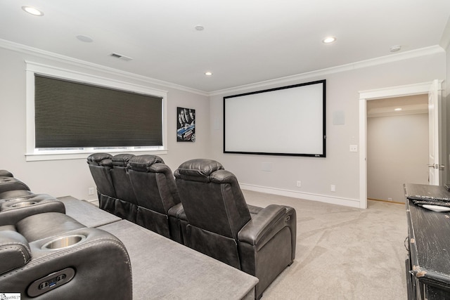 home theater room featuring recessed lighting, visible vents, crown molding, and light colored carpet